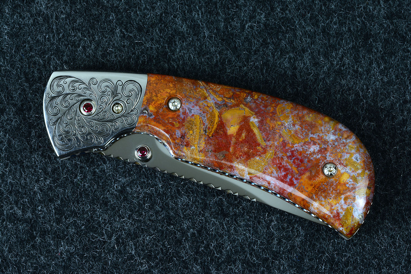 "Bellatrix" custom folding knife in T3 deep cryogenically treated ATS-34 high molybdenum martensitic stainless steel blade, hand-engraved 304 stainless steel bolsters, differerentially anodized 6AL4V titanium liners, Roostertail Agate gemstone handle, 304 stainless steel fasteners with garnet faceted gemstones "Bellatrix" custom folding knife in T3 deep cryogenically treated ATS-34 high molybdenum martensitic stainless steel blade, hand-engraved 304 stainless steel bolsters, differerentially anodized 6AL4V titanium liners, Roostertail Agate gemstone handle, 304 stainless steel fasteners with garnet faceted gemstones