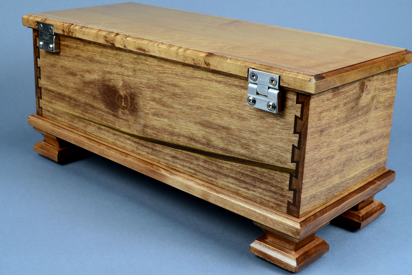 "Concordia and Sanchez" hardwood case detail, back view in maple, American black walnut, bird's eye maple, and 304 austenitic stainless steel fittings