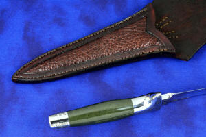 "Daqar" Custom handmade dagger, handle side view,  in T4 deep cryogenically treated CPM 154CM Powder metal technology martensitic stainless steel blade, hand-engraved, 304 austenitic stainless steel fittings, hand-engraved, nephrite jade gemstone handle, hand-carved leather sheath inlaid with American Bison skin