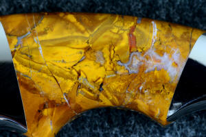 "Raptor" fine custom handmade karambit knife, 6 power enlargement of Polvadera Jasper-Agate gemstone handle, note crystal pockets and colorful complexity "Raptor" fine custom handmade karambit knife, 6 power enlargement of Polvadera Jasper-Agate gemstone handle, note crystal pockets and colorful complexity