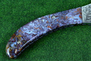 "Starling" reverse side gemstone handle detail in Rio Grande Agate with hand-engraved fasteners "Starling" reverse side gemstone handle detail in Rio Grande Agate with hand-engraved fasteners