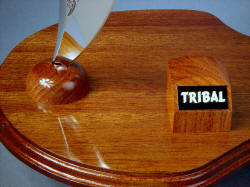 "Tribal" knife sculpture base, knife rest, and nameplate and block. Components are lauan hardwood (base) and mesquite hardwood